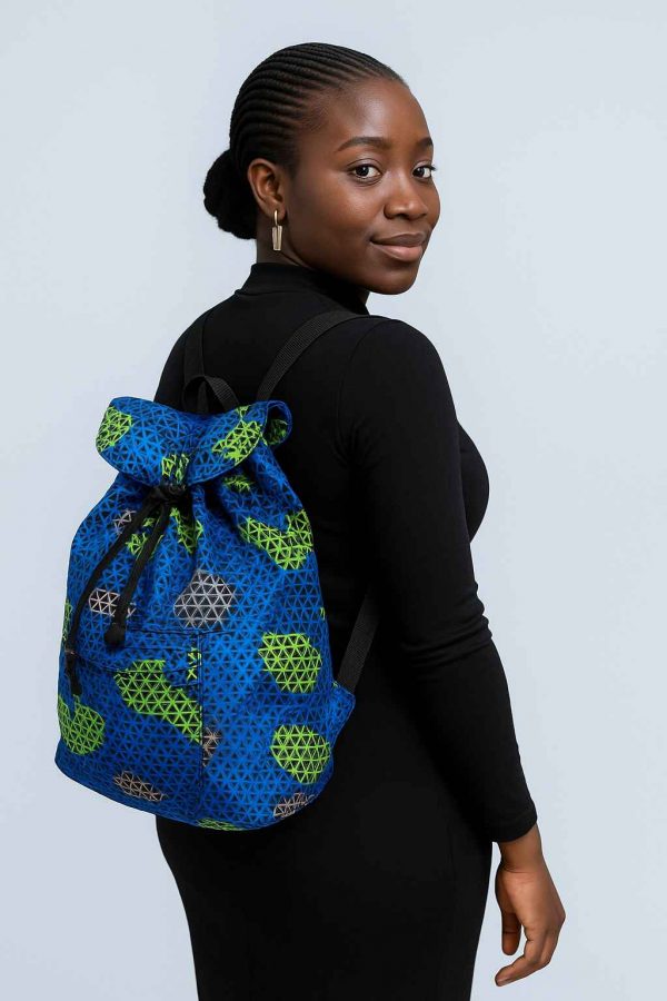 Beautiful Ugandan woman modeling a handmade African Kitenge drawstring backpack