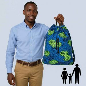 Handmade African Kitenge drawstring backpack shown beside a Bible and a reusable water bottle for size reference