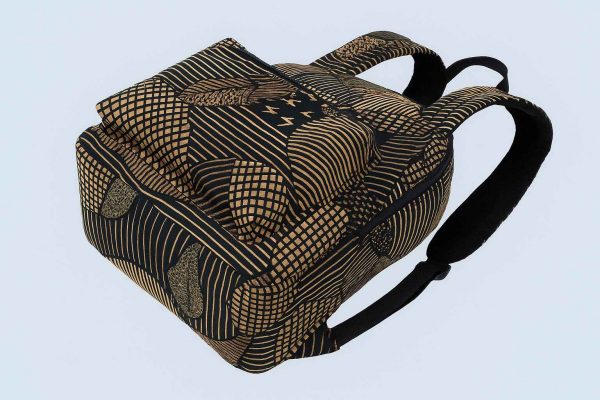 Bottom view of an African print backpack showing reinforced stitching and fabric pattern continuity