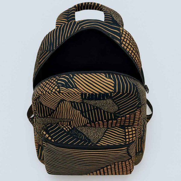 Top-down studio view of an African print backpack with zippered main compartment and brown-black fabric design