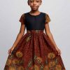 Front view of a girl’s flare dress in African kitenge, featuring short patterned sleeves and modest A-line silhouette