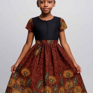 Front view of a girl’s flare dress in African kitenge, featuring short patterned sleeves and modest A-line silhouette