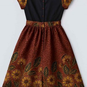 Back view of a girls’ kitenge flare dress with patterned short sleeves and button-down black bodice