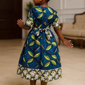 Back view of handmade Kitenge girls’ dress with leaf print