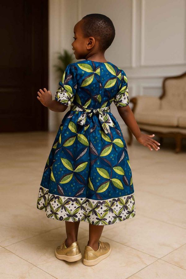 Back view of handmade Kitenge girls’ dress with leaf print