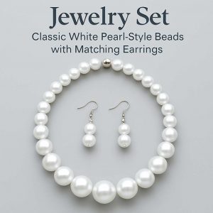 Studio front view of a handmade pearl-style jewelry set with a beaded necklace and matching earrings