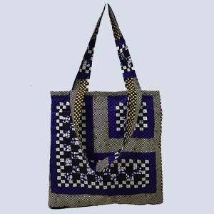 Front view of Lydia woven handbag from Uganda with soft structure