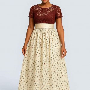 Angled view of party dress with maroon lace bodice and cream floral skirt