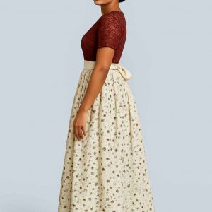Side view of floral party dress with lace bodice and ribbon waist