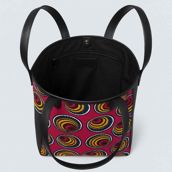 Interior of African Kitenge tote bag with pink yellow spiral print