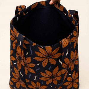 Interior view of a handmade African print tote bag showing open fabric compartment and inner seams
