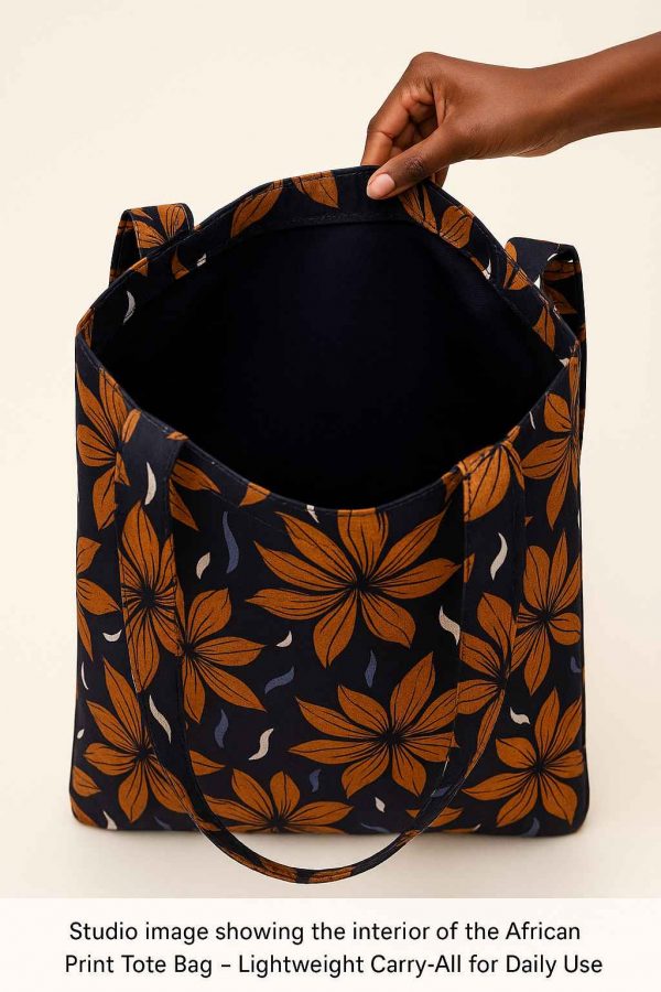 Interior view of a handmade African print tote bag showing open fabric compartment and inner seams