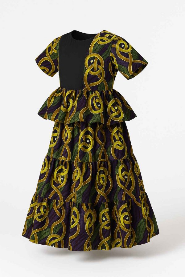 Angled view of a girls’ African kitenge dress with peplum waist, tiered skirt, and short sleeves in vibrant yellow, green, and purple fabric