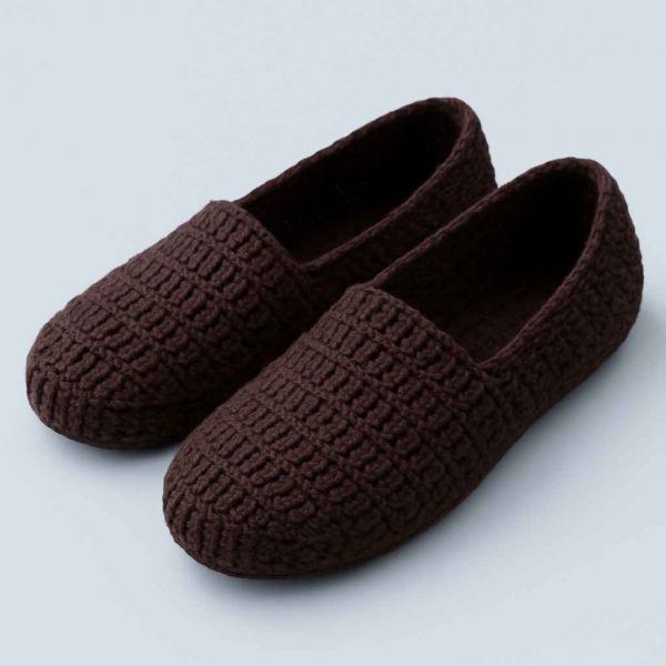Angled view of handmade crochet house slippers