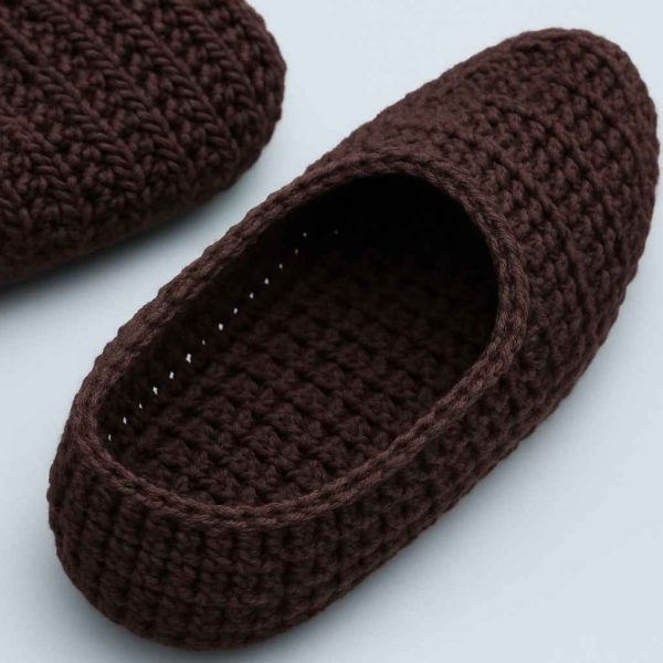 Close-up detail of handmade crochet house slippers