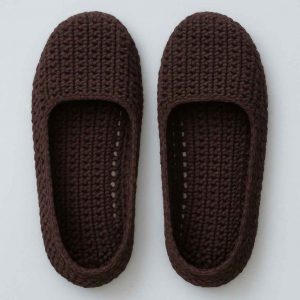 Top-down view of handmade crochet house slippers