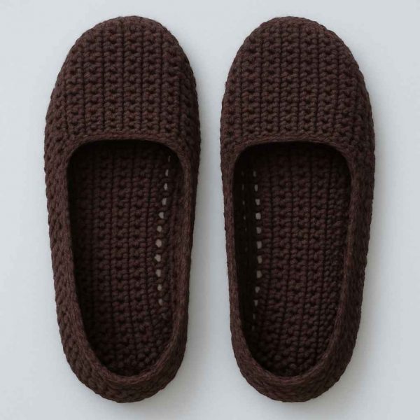 Top-down view of handmade crochet house slippers