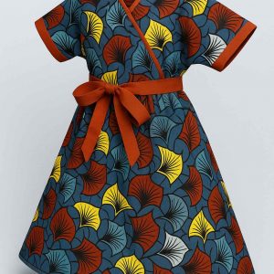 Angled view of handmade Kitenge girls’ dress
