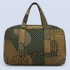 Side view of handmade Kitenge travel duffel bag