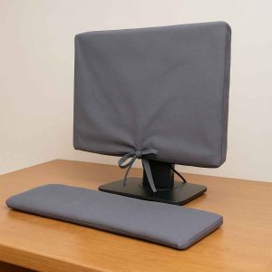 Angled view of handmade monitor and keyboard cover set