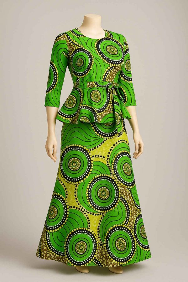 Angled studio view of green kitenge peplum dress