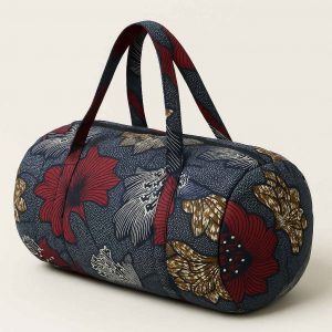 Angled view of handmade African kitenge duffle bag