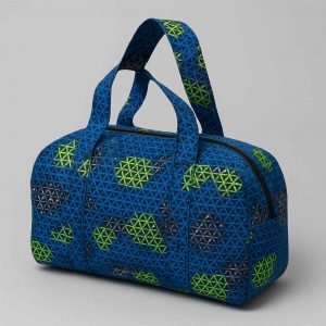 Angled view of handmade kitenge duffle bag