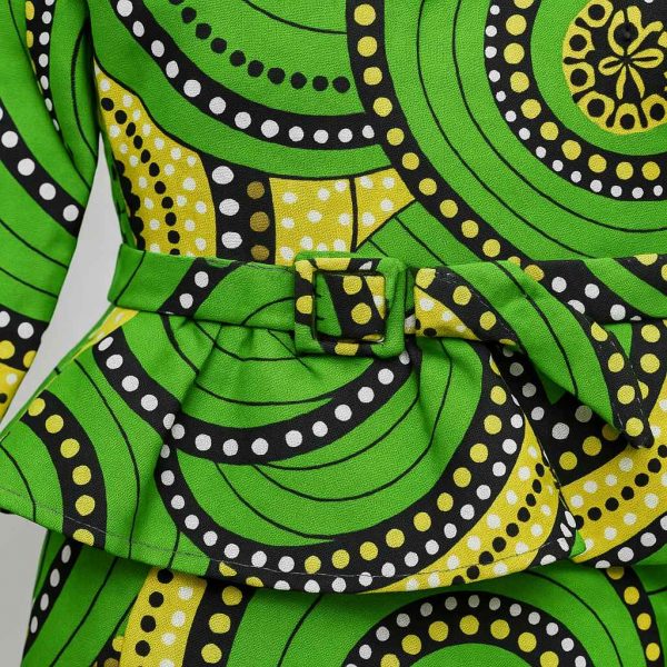 Close-up of green kitenge peplum dress fabric