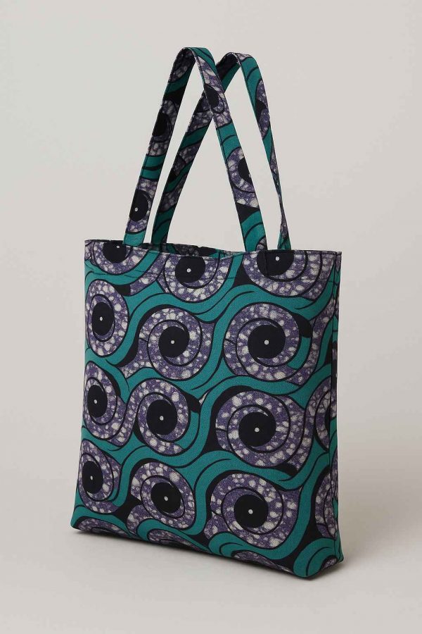 Angled view of handmade African kitenge tote bag