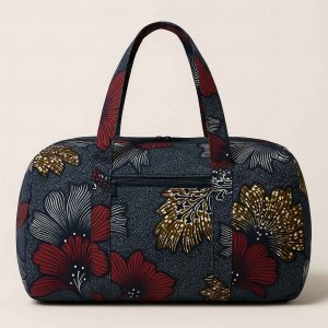 Side view of handmade African kitenge duffle bag