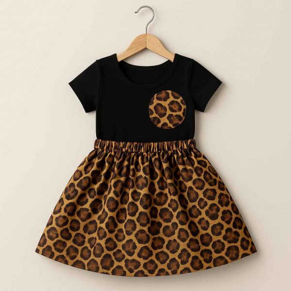 Bottom angle view of girls' modest leopard-print outfit