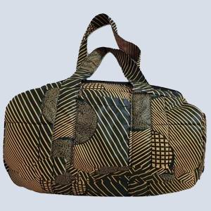 Front view of Kanzu travel bag from Uganda featuring printed canvas texture