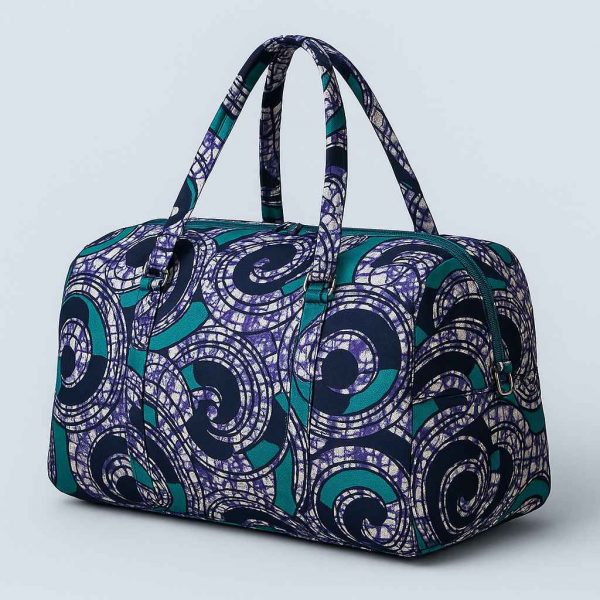 Angled studio image of African print duffle bag showing depth and side details
