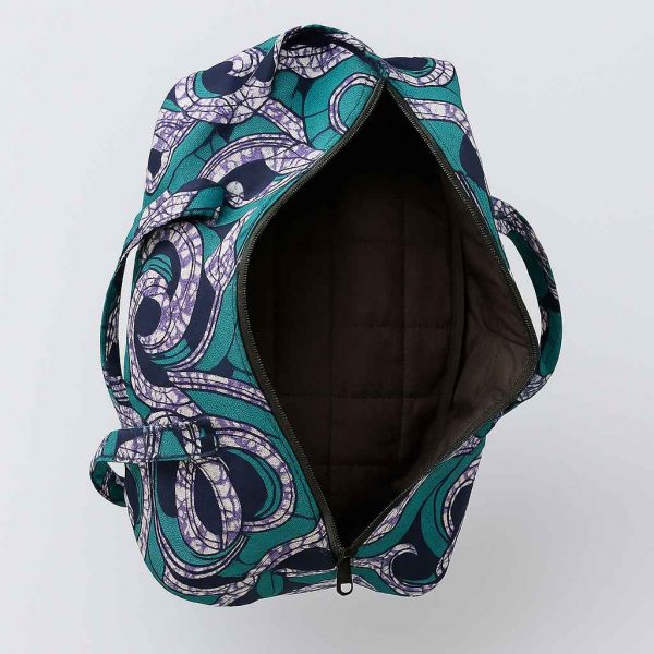 Interior view of African print duffle bag showing soft lining and spacious compartment