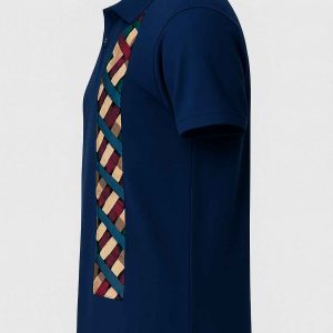 Left side view of navy blue polo shirt with kitenge stripe patch