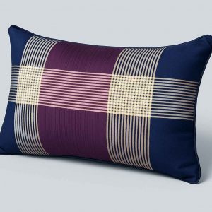 Angled view of a decorative striped pillow showcasing its texture and pattern
