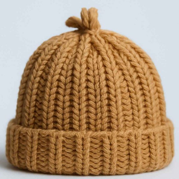 Close-up of handmade ribbed knit hat stitches