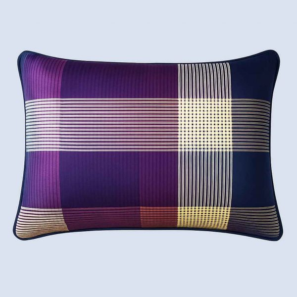 Front view of a stylish striped decorative pillow in deep purple and cream tones