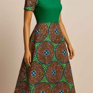 Side view of African Kitenge modest flare dress with swirl print