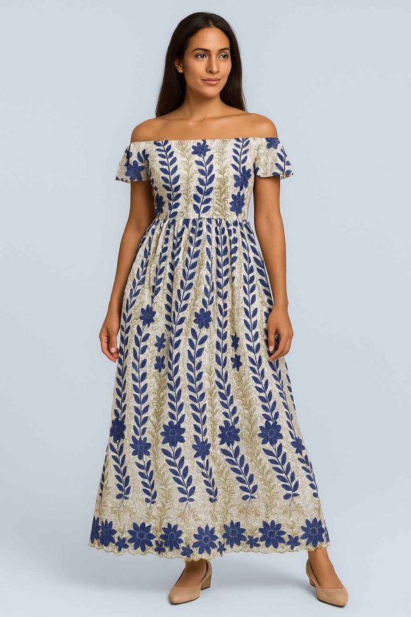 Angled studio view of the Royal Bloom Dress with blue embroidery