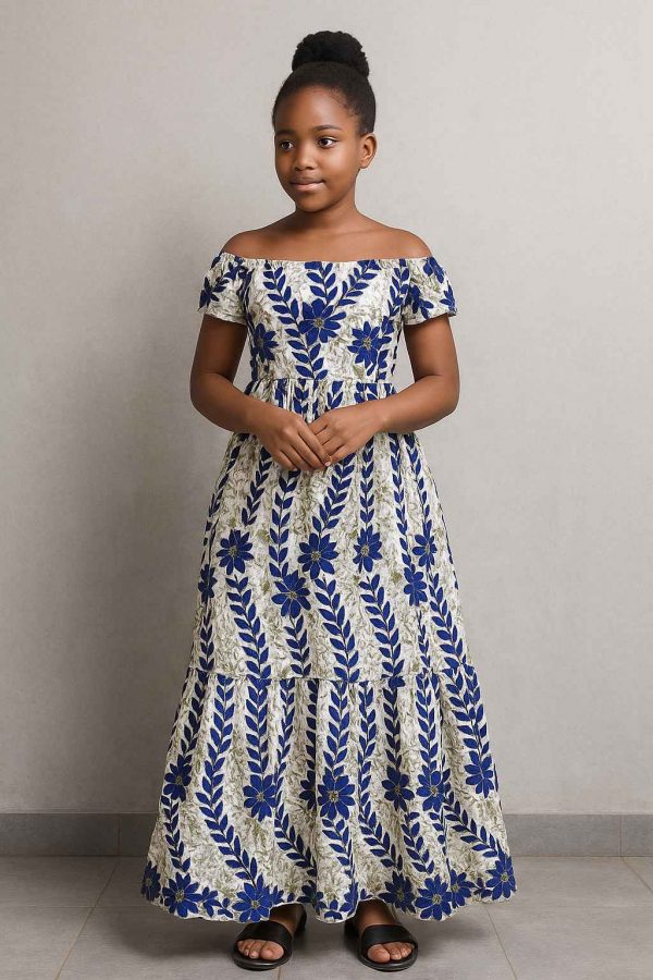 Lifestyle portrait of a young African girl in a floral Royal Bloom Dress