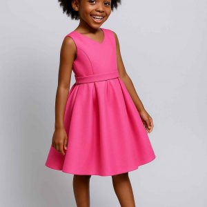 Angled view of handmade elegant girls’ dress