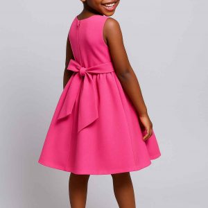 Back view of handmade elegant girls’ dress