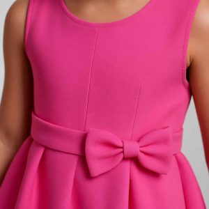 Close-up detail of handmade elegant girls’ dress