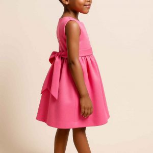 Side view of handmade elegant girls’ dress