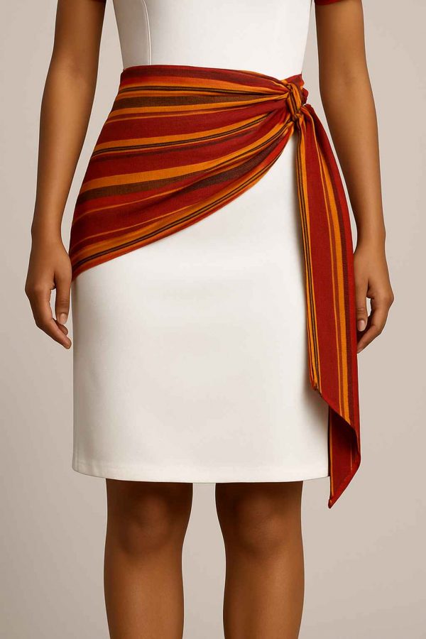Bottom view of a white cultural wrap dress with colorful side sash