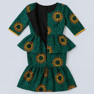 Interior view of an African one-step peplum dress showing clean seams, stitched lining, and reinforcement beneath the peplum and skirt
