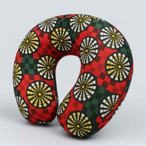 Studio image of African wax print U-shaped neck pillow taken at a slight angle to show depth and form